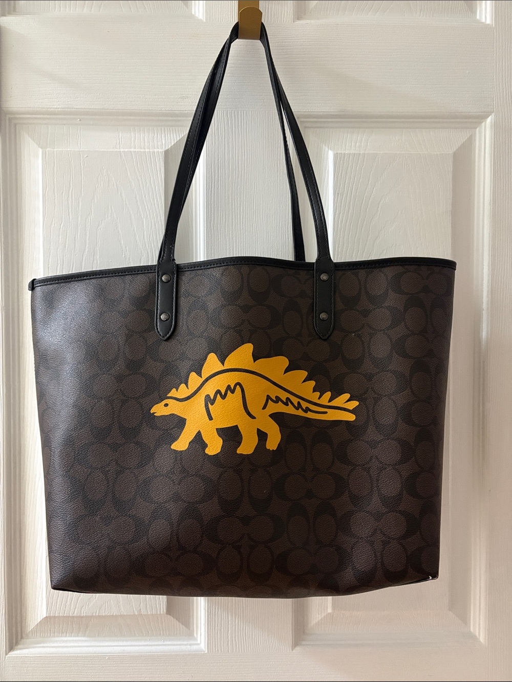 Coach Brown Signature Tote with Yellow Dinosaur Motif